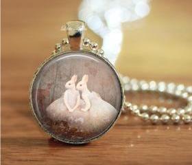 rabbit humans sisters woodland glass dome necklace or keychain